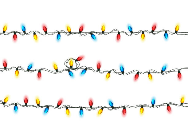 istock Christmas Festive Lights. Decorative Glowing Garland Isolated on White Background. Shiny Colorful Decoration for Christmas and New Year Holidays 1289792054