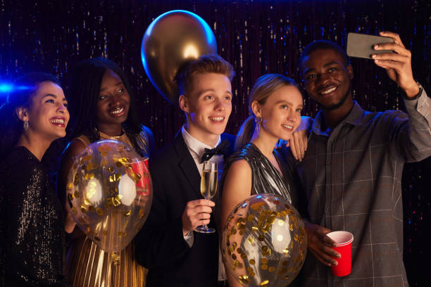 istock Friends Taking Photo at party 1289792822