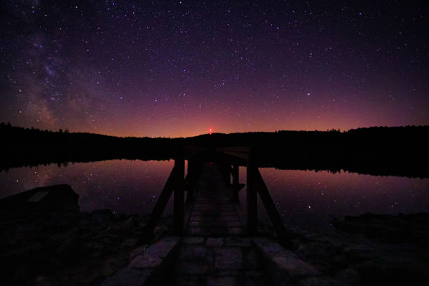 the pier by the pond, view of the evening sky