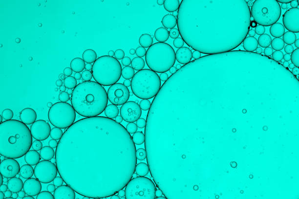 istock Soap bubbles and acrylic paint in oil 1289795574