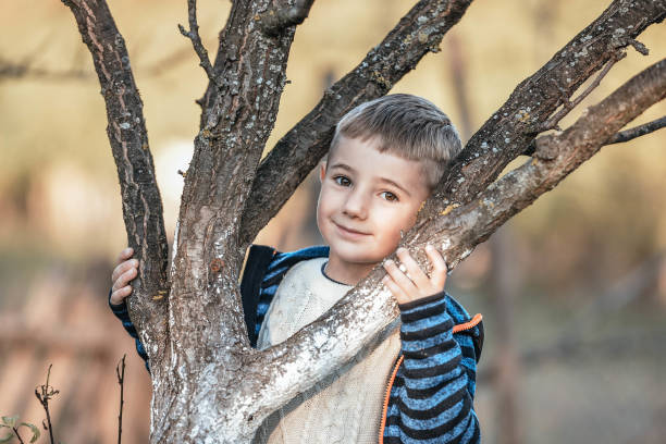 istock Cute boy enjoying perfect day in nature 1289795615