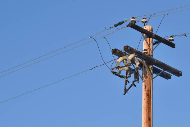 istock Power line with glass insulators and wires. 1289797489
