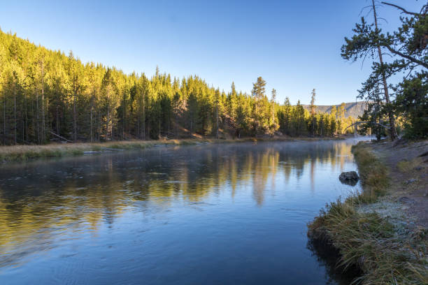 istock Morning Mist on Wyoming River 1289798820