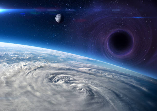 Earth and Black hole. Earth, Moon and Black hole. Abstract space wallpaper. Storm, hurricane, typhoon - concept cataclysm in universe. Elements of this image furnished by NASA. ______ Url(s): 
https://images.nasa.gov/details-iss040e088925
https://www.nasa.gov/multimedia/imagegallery/image_feature_1538.html
Software: Adobe Photoshop CC 2015. Knoll light factory. Adobe After Effects CC 2017. big bang stock pictures, royalty-free photos & images