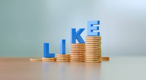 istock Blue Letters Sitting On Coin Stacks Writes Like Before Defocused Background 1289802342