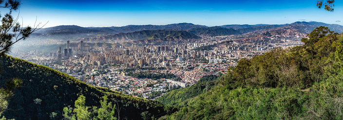 Aerial panoramic view of Caracas valley from El Avila National Park. View of the western part of the city.