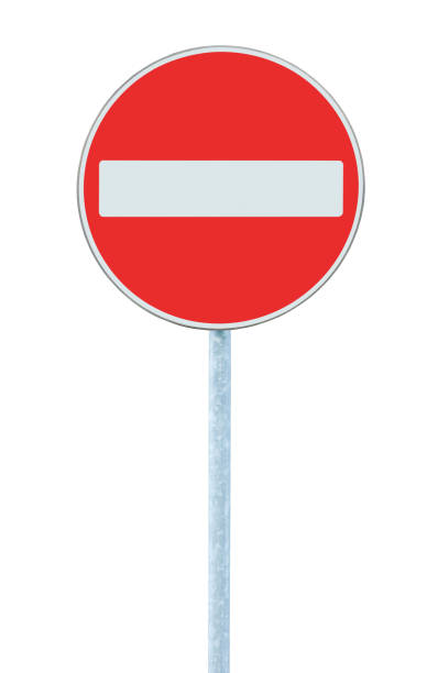 istock No entry road sign, traffic roadside warning signage on grey pole post, large detailed vertical isolated closeup 1289807064