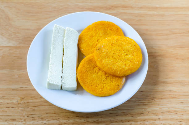 Tortillas are made with yellow corn dough and cheese is made with fresh cow milk