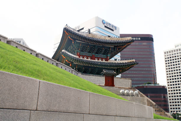 Seoul, South Korea - July 4, 2018. Sungnyemun Gate also known as Namdaemun gate in downtown Seoul with modern buildings in the background.