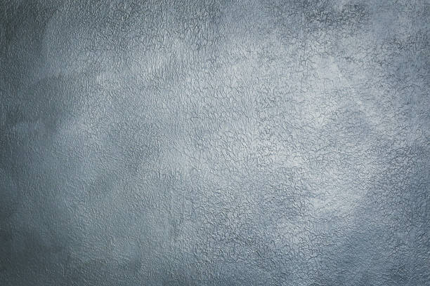 istock Grey textured decorative stucco for background with vignette 1289816066