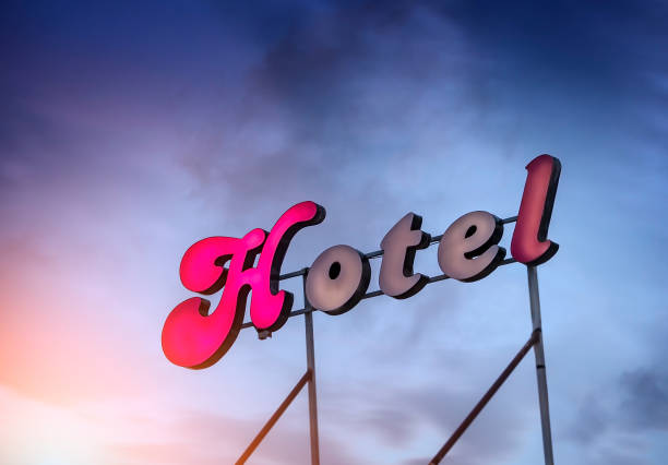 istock Neon hotel sign on the building 1289819539