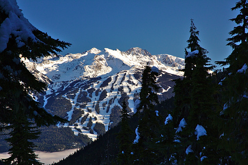 Whistler Blackcomb mountain ski trails seen from the distance, Whistler, British Columbia, Canada