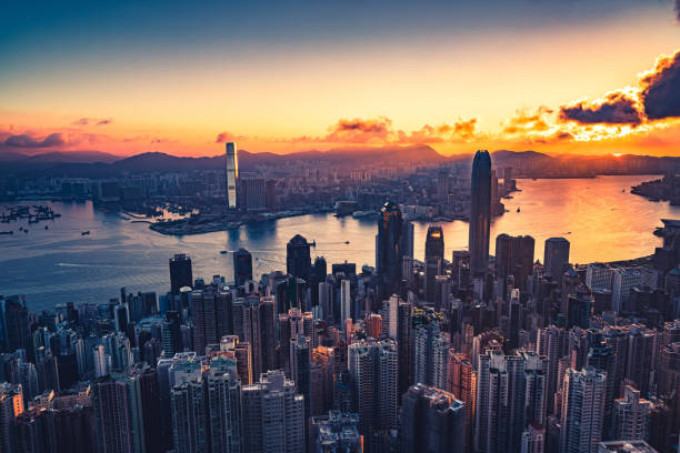istock Hong Kong skyline at sunrise 1289824222