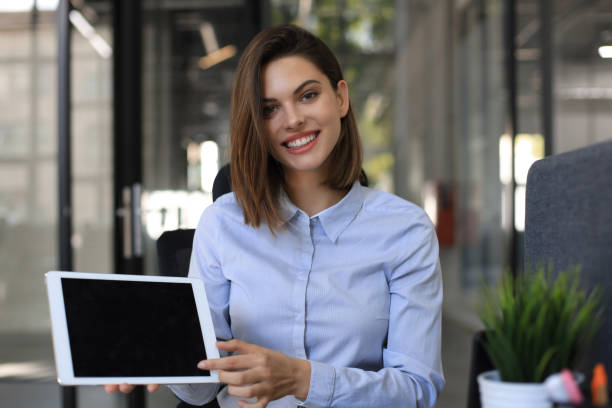 istock Freelance operator talking with headsets and consulting clients from office. 1289831403