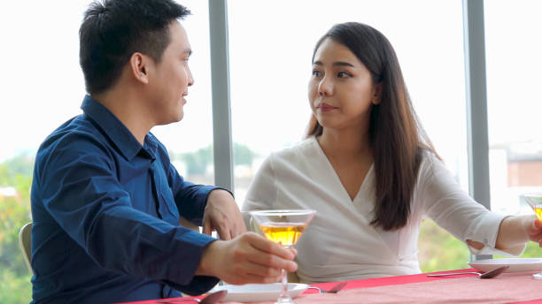 istock Happy romantic couple eating lunch at restaurant 1289832996