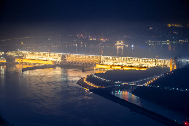 three gorges dam at night three gorges dam at night, yichang city, hubei province, China three gorges photos stock pictures, royalty-free photos & images