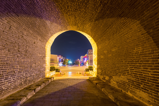 in ancient city tower at night, longxi county, gansu province, China