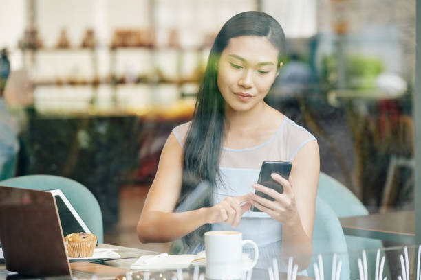 istock Businesswoman checking phone 1289841442