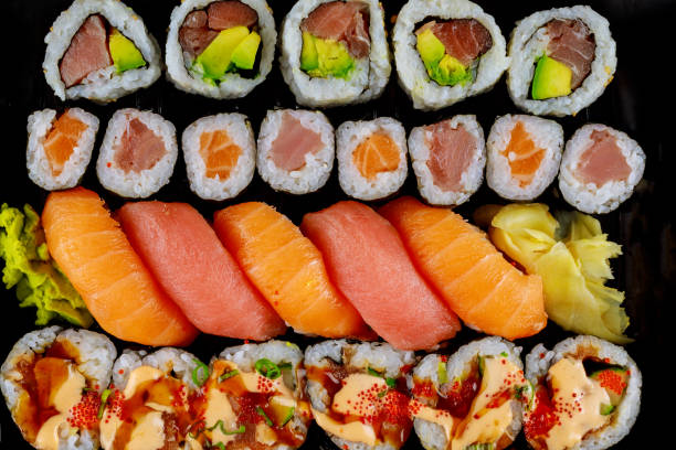 istock Close up of Japanese sushi roll with raw fish. 1289841781