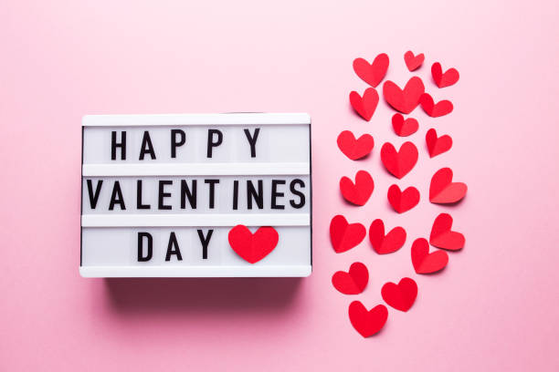 istock Box with the inscription Happy Valentine's Day on a pink background 1289842607