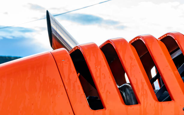 Exhaust pipe and air intake on a large construction machine. Close up.