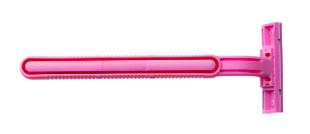 istock Female pink razor shaver isolated on white background 1289848855