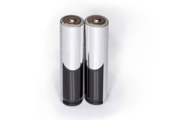 istock Alkaline AAA batteries on a white background close-up 1289850913