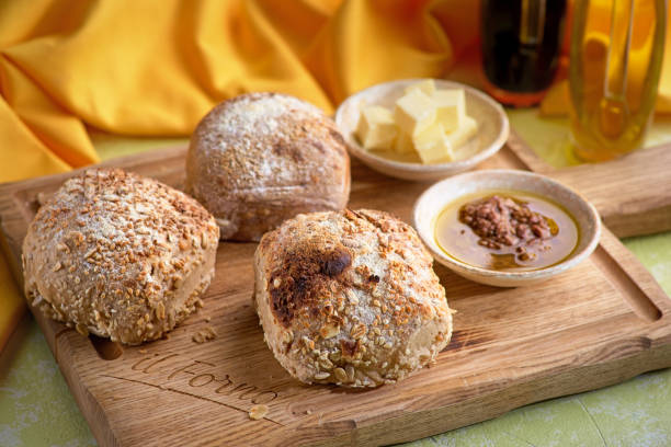 istock homemade cottage cheese bread rolls in a basket on light table. 1289852388