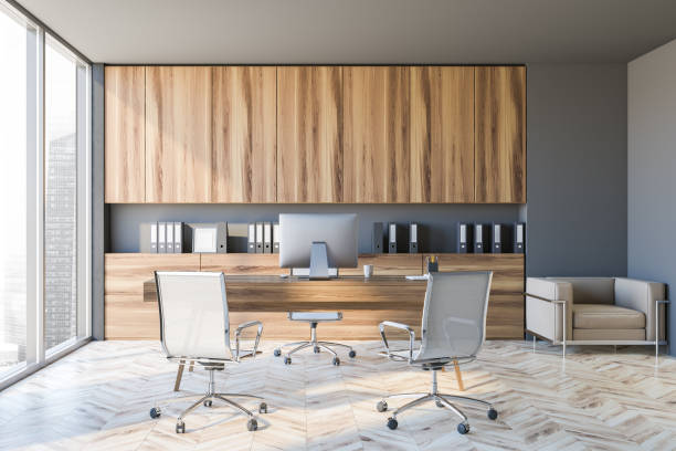 istock Modern gray CEO office interior with wooden cabinets 1289854474