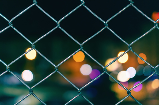 Colorful shot of chain-link fence, abstract, shallow DOF