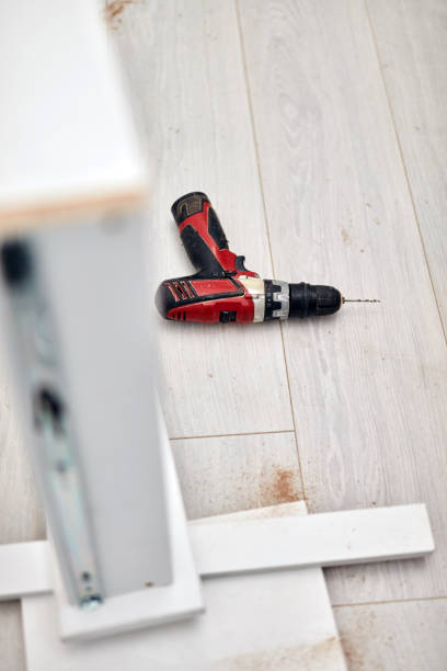 istock Handyman's cordless drill for fixing furniture and various things. 1289854660