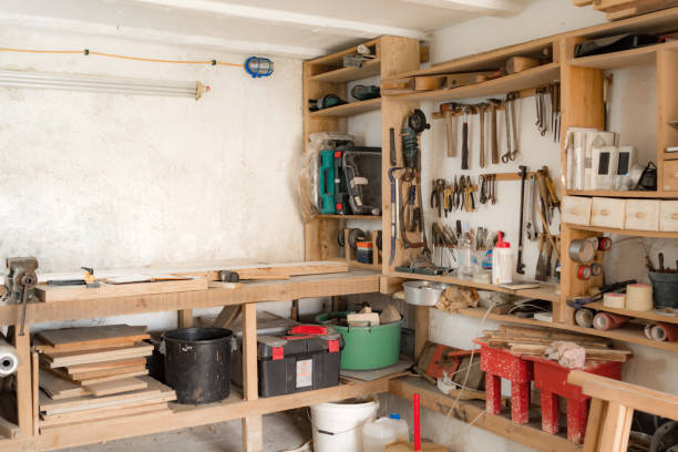 istock Various carpenter's tools and supplies in a garage. 1289855491