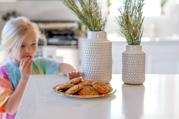 istock Ute Girl Eating At Home 1289857156