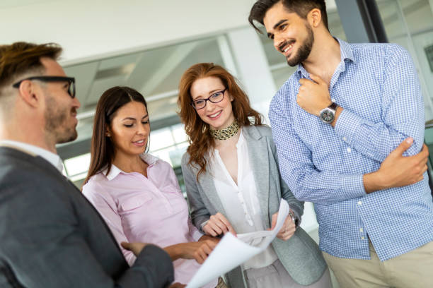 istock Business people discussing documents and ideas at meeting 1289859110