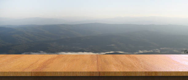 istock Empty wood table top on Holidays in summer and mountain View on copy space background.Product presentation in fresh nature. Vintage tone filter effect color style.- 3d rende 1289862878