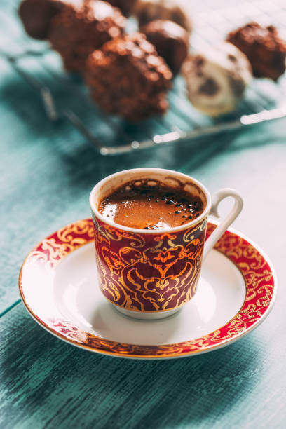 istock Turkish Coffee on Wooden Table With Flower and Chocolate Background 1289863052