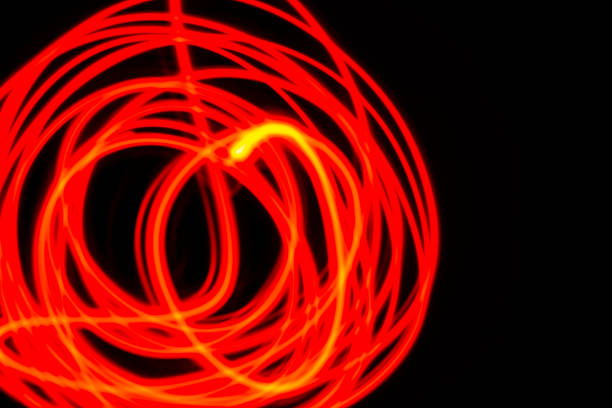 istock Abstract light painting background on black banner 1289863455