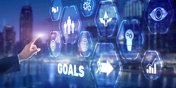 istock Goal achievement concept. Man presses his finger on a virtual screen. 1289864265
