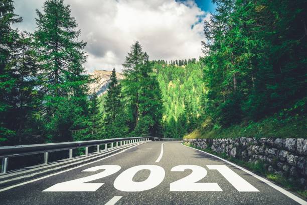 istock 2021 New Year road trip travel and future vision concept . 1289864774