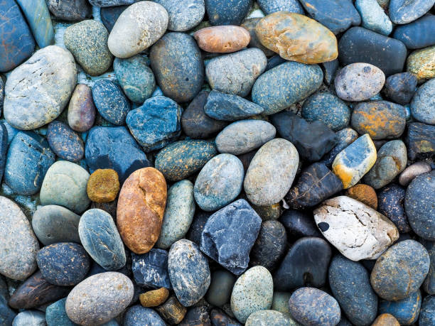 istock Sea pebbles, Sea stones background. 1289865772