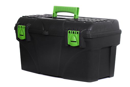 Black and green plastic tool box isolated over white background