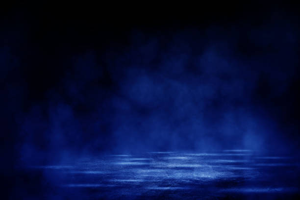 istock Concrete floor grunge texture background with fog or mist and blue lighting effect. 1289868802