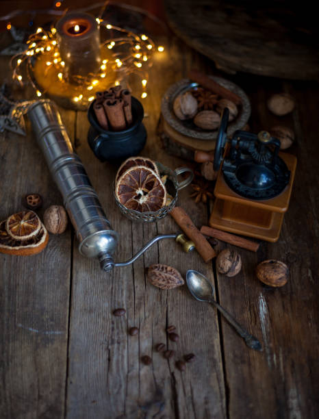 istock Still life of cinnamon sticks, coffee grains on a wooden table. Copy space 1289869877