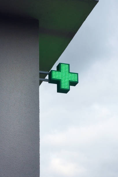 istock Pharmacy sign on the street 1289873542