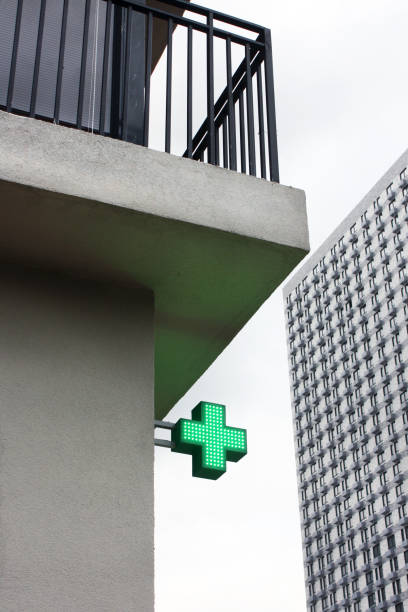 istock Pharmacy sign on the street 1289873561