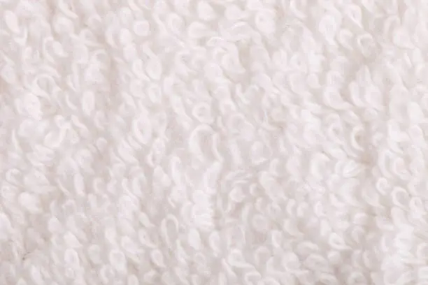 Texture of white terry towel close-up