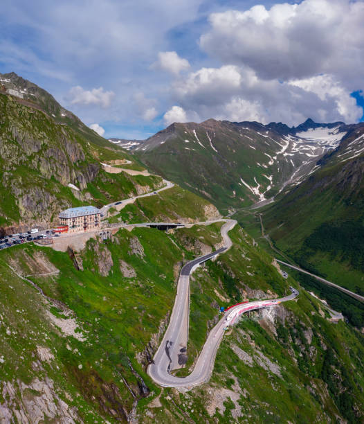 Aerial view of the alpine road through Furka Pass, Switzerland Aerial view of the alpine road through Furka Pass, Switzerland. Furka is a high mountain pass in the Swiss Alps connecting Gletsch, Valais with Realp, Uri. furka pass photos stock pictures, royalty-free photos & images