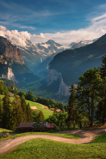 lauterbrunnen valley in the swiss alps viewed from the alpine village of wengen - jungfrau waterfall tree nature imagens e fotografias de stock