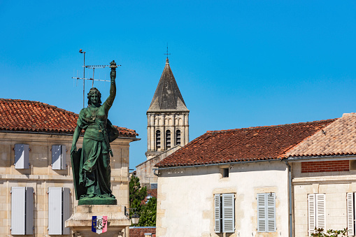 Statue of the Republic, also known as Mariann, on Place de la République in Jonzac. The monument was inaugurated in 1894 and created by the sculptor Gustave Frédéric Michel (1851–1924) for the centenary of the Revolution. The The sculpture is similar to the Statue of Liberty: Jonzac, France