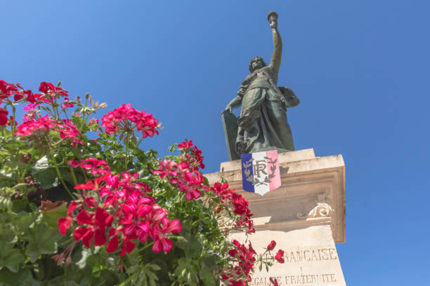 Statue of the Republic, also known as Mariann, on Place de la République in Jonzac. The monument was inaugurated in 1894 and created by the sculptor Gustave Frédéric Michel (1851–1924) for the centenary of the Revolution. The The sculpture is similar to the Statue of Liberty: Jonzac, France